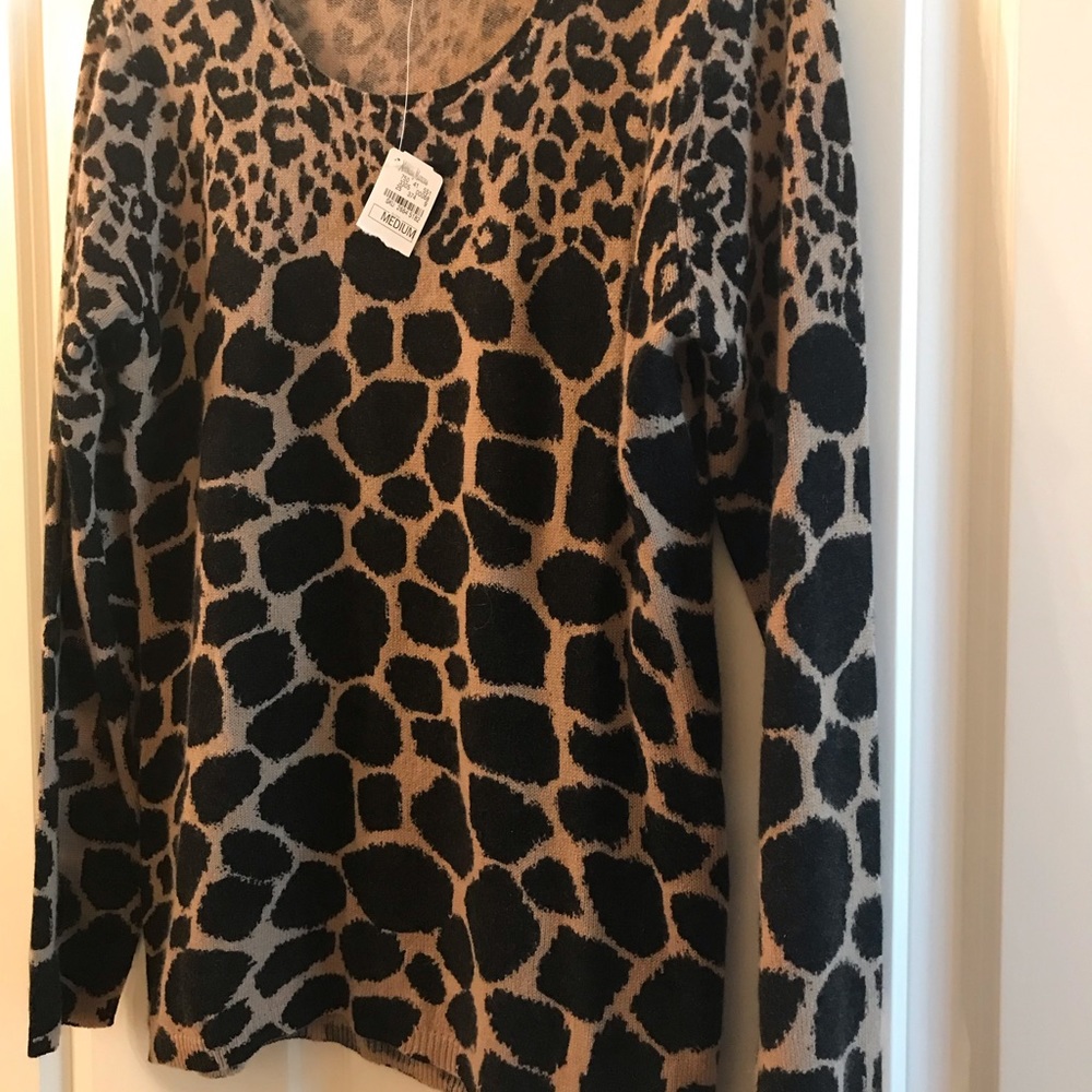 New with tags Cashmere sweater from Neiman Marcus. Leopard pattern. Stunning.